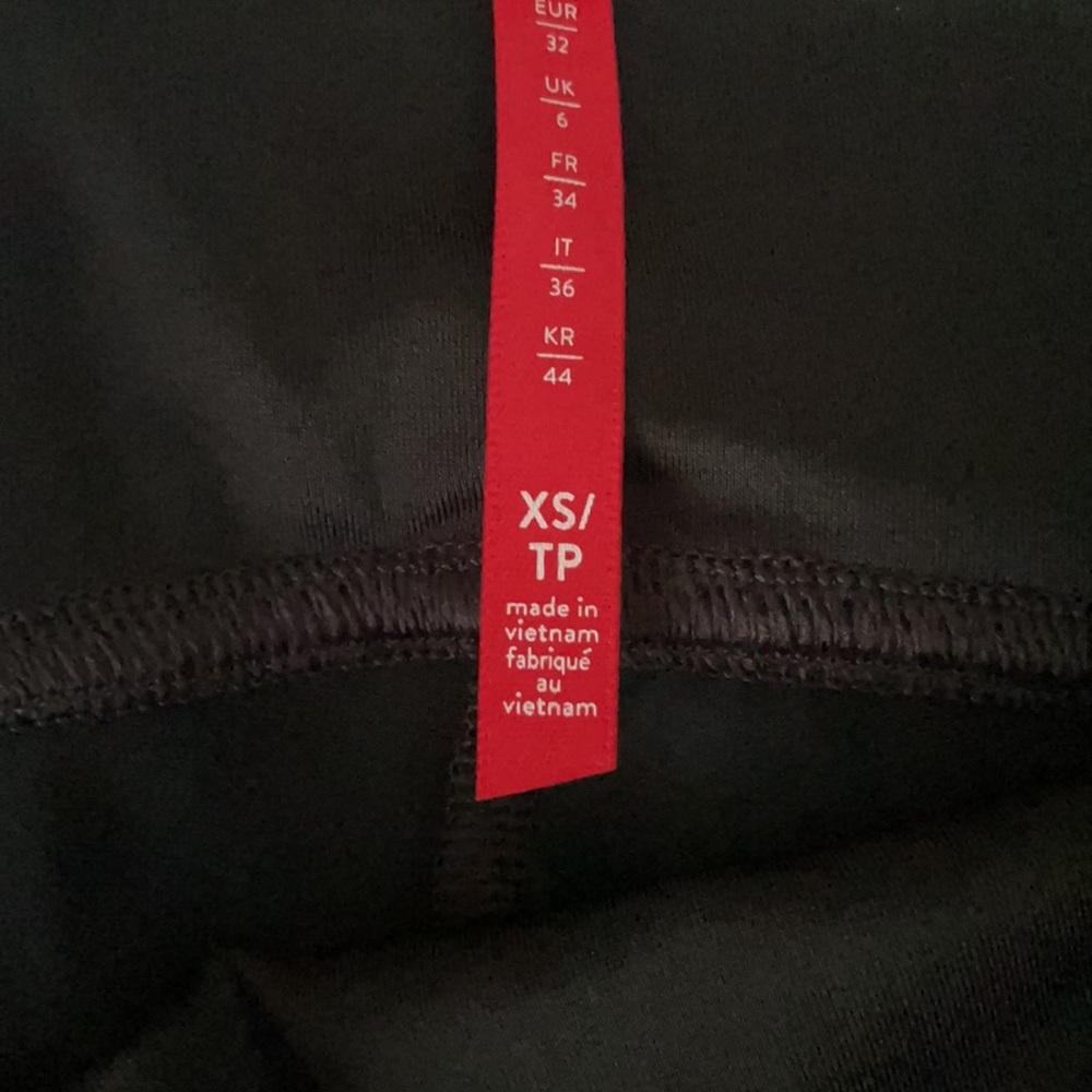 Only worn ONCE. XS Spanx black camo leggings. - Picture 3 of 4